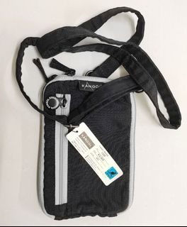 Brand new Kangol Travel Sling bag with detachable sling and pouch