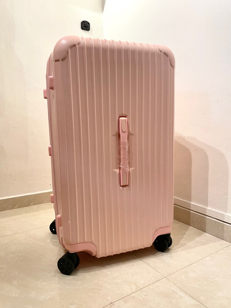 Pastel pink sales luggage