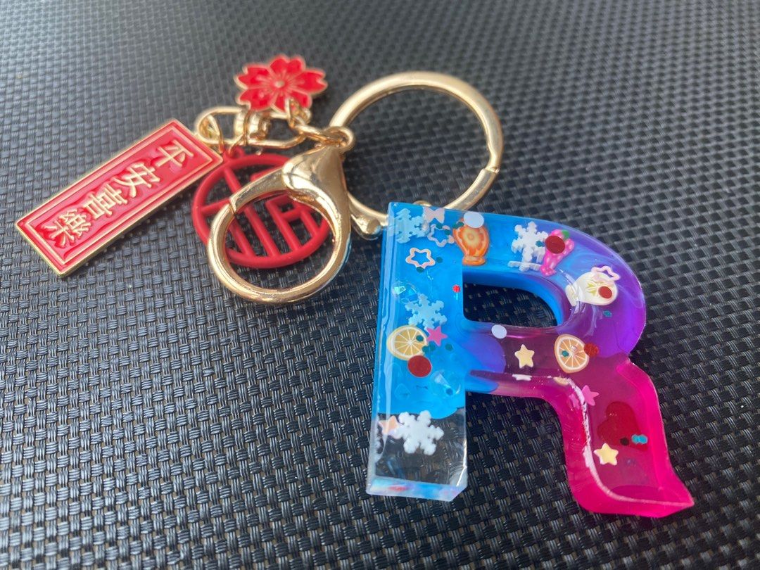 R name clearance keychain