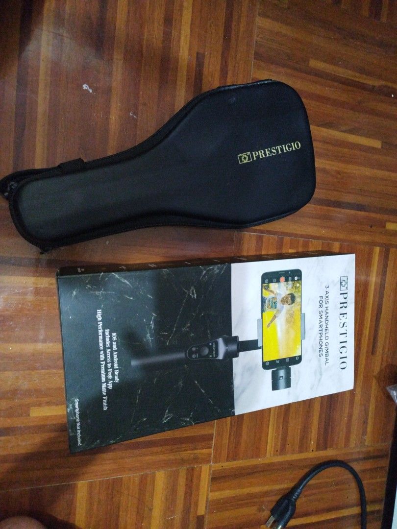 Prestigio 3-axis handheld for smartphones (with hard case) (Category: Gimbals & Stabilizers ) located in Las Pinas. Submitted by markmanship05 (Listing ID 1264636625, Image 2). Description: Prestigio 3-axis handheld gimbal for smartphones (hard case included) Gimbal adjustment knob has slighty flaws (check photo) but still workable RFS: No longer using.