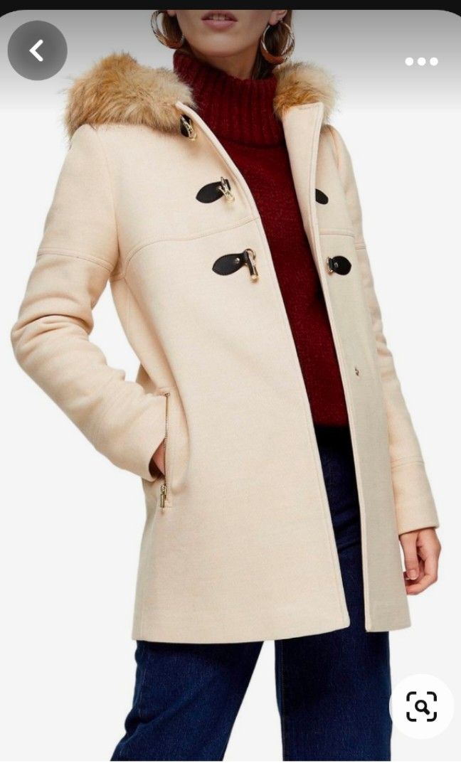 Topshop Camel hood coat (Category: Coats, Jackets and Outerwear) located in Malabon City. Submitted by luckyfive (Listing ID 1264749751, Image 1). Description: Topshop Camel Patty Toggle Coat faux fur trim hood, like new Labelled UK 6, Fits S-M pit to pit-18 inches shoulder to shoulder-15 sleeves lenght- 24 back neck to hem- 31 more items listed everyday discount on multiple purchase follow me and get extra 5% discount, 10% to repeat customer.
