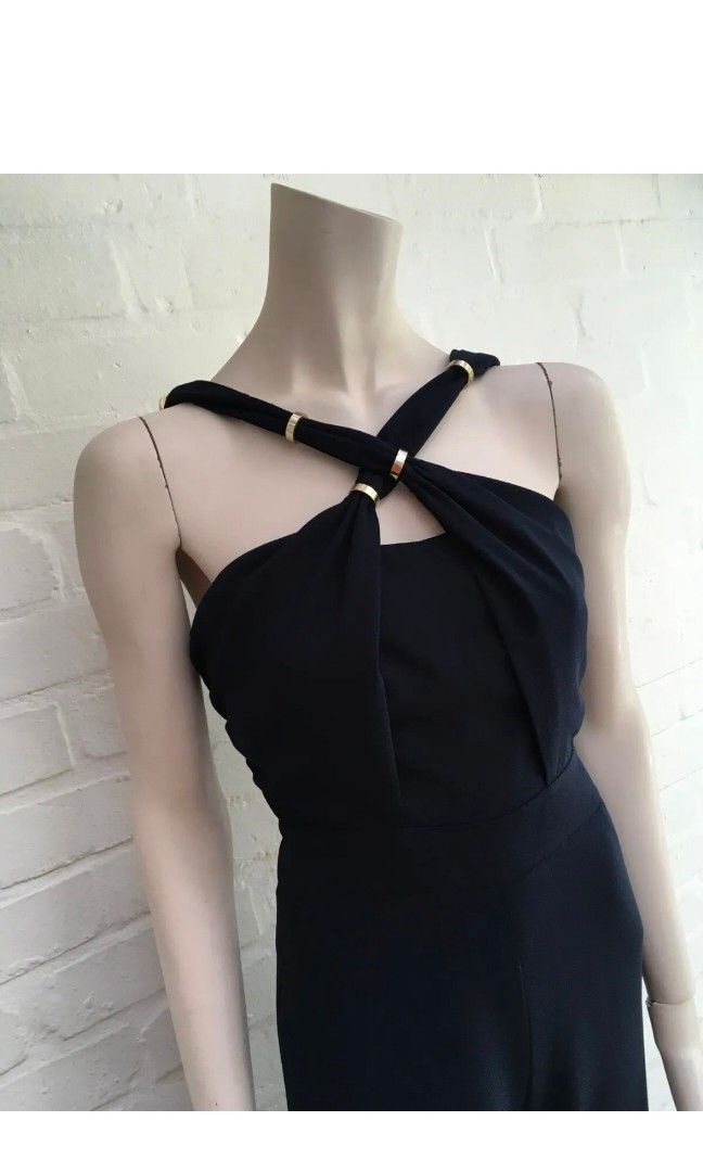 Whistles navy blue jumpsuit (Category: Jumpsuits) located in Malabon City. Submitted by luckyfive (Listing ID 1264675388, Image 3). Description: Whistles navy blue halter jumpsuit gold ring details on strap wide leg, 2 side pocket UK designer brand, high quality, structured, fake back pocket bust boning, concealed zip back pit to pit, 18 inches waist-14 lenght,side pit to hem- 51 Retails for almost 200pounds like new, fits M more items listed eve