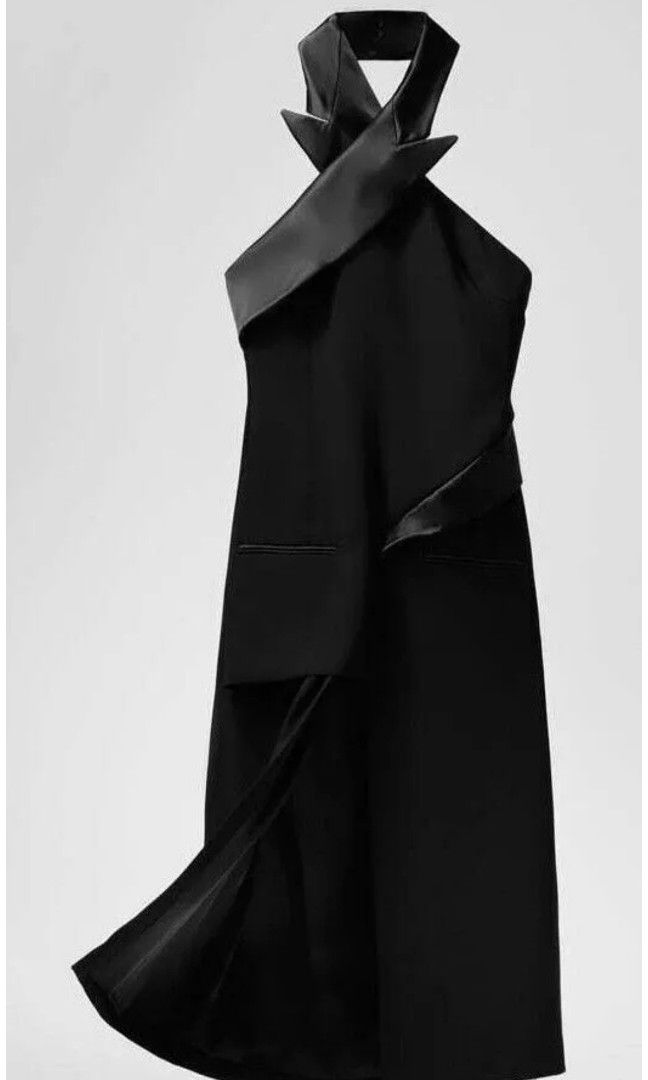 Zara tuxedo dress (Category: Dresses) located in Malabon City. Submitted by luckyfive (Listing ID 1264660029, Image 2). Description: Zara Limited Edition tuxedo black halter dress with slit. really pretty dress, BNWT attached, labelled M Accumulated impulse buy in London that I didn't get to wear More items listed everyday discount on multiple purchase follow me and get extra 5% discount, 10% to repeat customer.