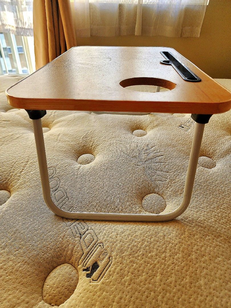 Foldable Laptop Table with Cupholder (Category: Office Furniture & Fixtures) located in Quezon City. Submitted by queentana_finds (Listing ID 1268787946, Image 3). Description: Nordic. No damage. Foldable laptop table with cup holder. Can be used in the bed. RFS: Not using it anymore..