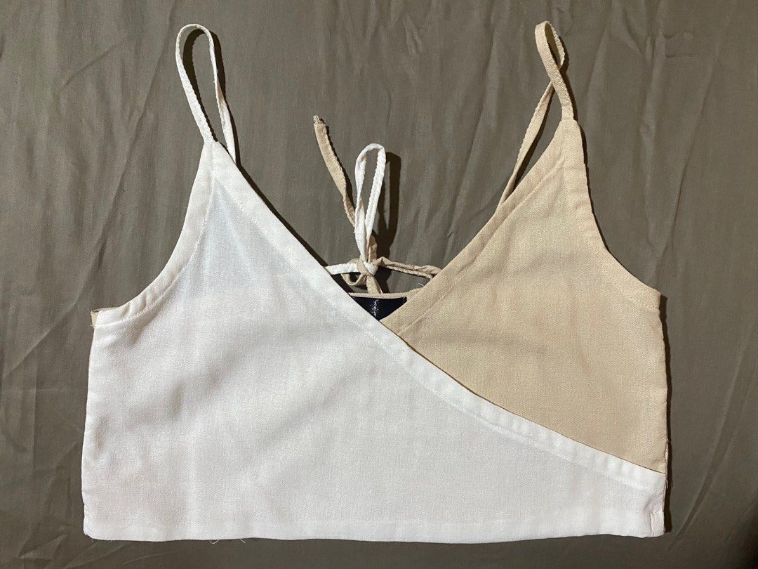Foxglove Two-Tone Linen Top (Category: Sleeveless) located in Marikina City. Submitted by msgdptrp (Listing ID 1268853594, Image 1). Description: ‼️ AVAILABLE, ON-HAND ‼️ ‼️ NEGOTIABLE ‼️ – purchased at ₱660 from @shop.foxglove on IG – white and beige Ky sleeveless top with adjustable straps in two-tone (snow + sand) in size MEDIUM – brand new without tag, never worn but washed – NO WHEN WORN PHOTOS as it is already too loose on me – measurements
