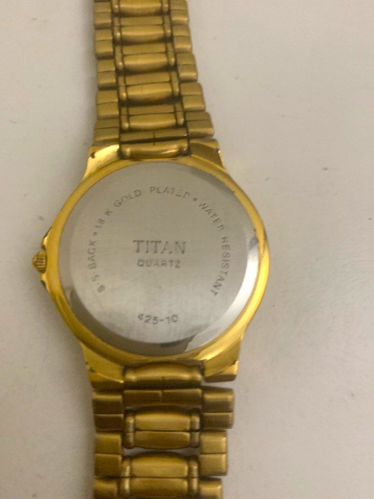 Buy Online Titan Nebula Ashvi Quartz Analog 18 Karat Solid Gold Watch for  Women - nr5578dm03 | Titan