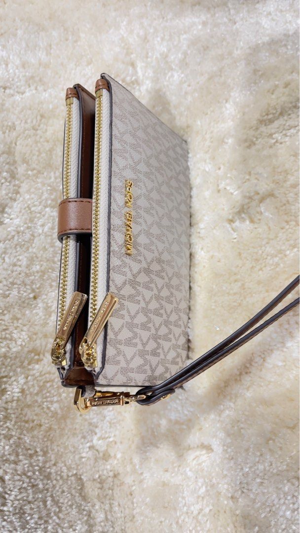 Michael kors hotsell wallet with strap