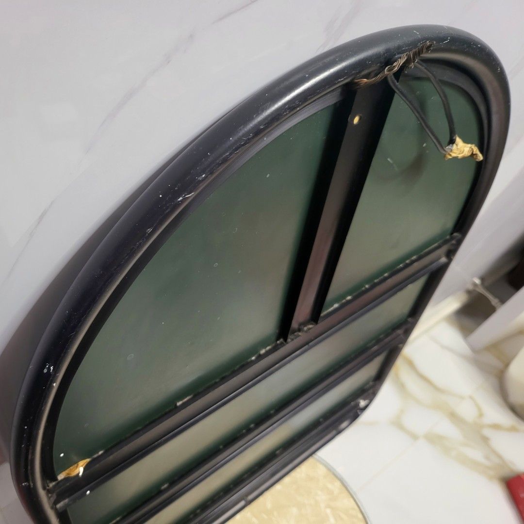 Mirror, wall hanging. Black metal frame. Size 63 x 50 x 2 cm. Weigh 2