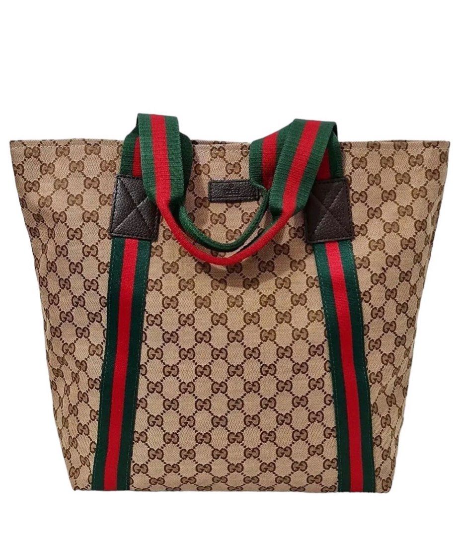 Preloved Gucci Tote bag - canvass (Category: Luxury Bags & Wallets) located in Binan City. Submitted by mcsolis (Listing ID 1268825763, Image 1). Description: Japan ukay No flaws With dust bag What you see is what you get.