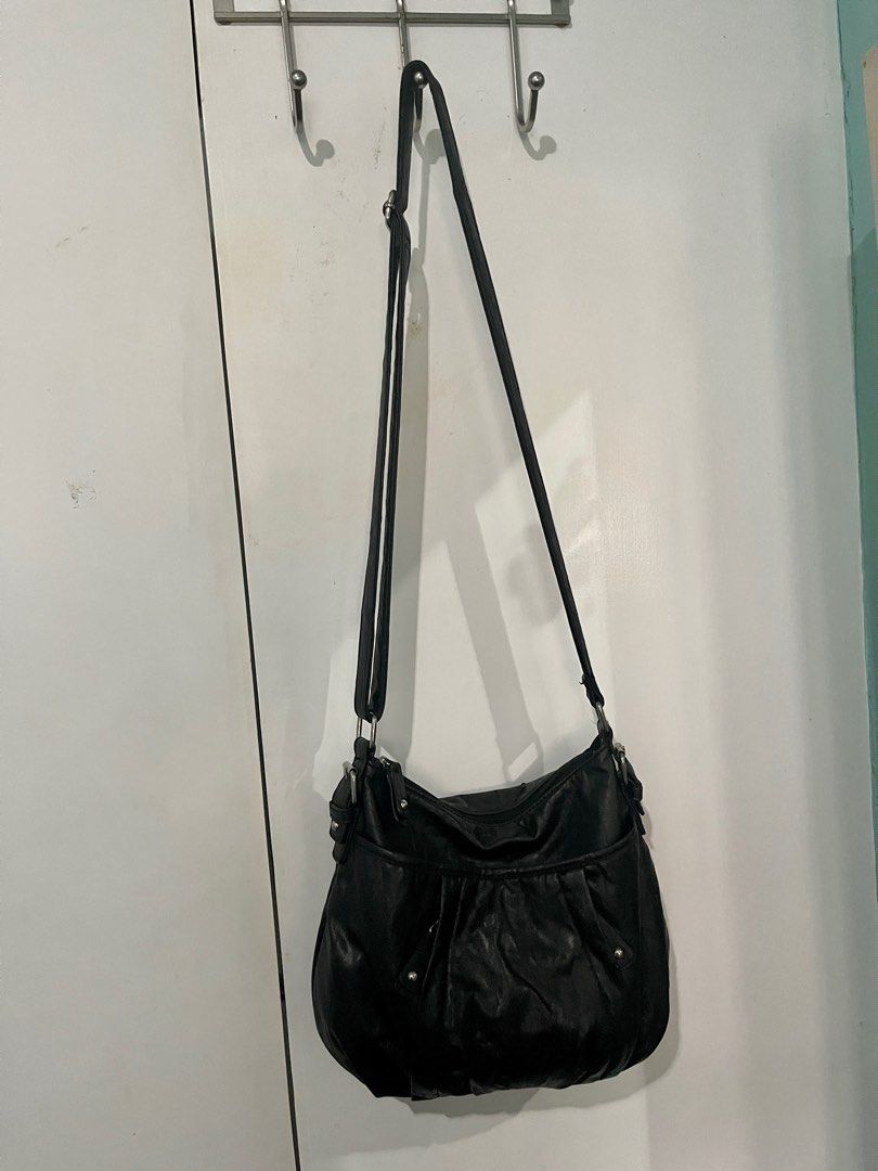 Preloved Nine&Co crossbody bag (Category: Cross-body Bags) located in Cainta. Submitted by jdcmd (Listing ID 1231002198, Image 3). Description: PRELOVED only, personal use Authentic, bought from US With signs of usage and storage RFS: decluttering Pls manage your expectations :) SF c/o buyer via lalamove, grab or lbc only No COD or COP Payment first basis Gcash or bdo bank transfer only .