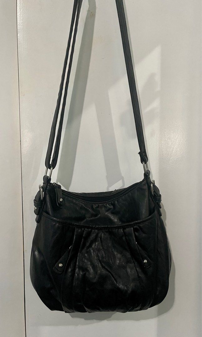 Preloved Nine&Co crossbody bag (Category: Cross-body Bags) located in Cainta. Submitted by jdcmd (Listing ID 1231002198, Image 1). Description: PRELOVED only, personal use Authentic, bought from US With signs of usage and storage RFS: decluttering Pls manage your expectations :) SF c/o buyer via lalamove, grab or lbc only No COD or COP Payment first basis Gcash or bdo bank transfer only .