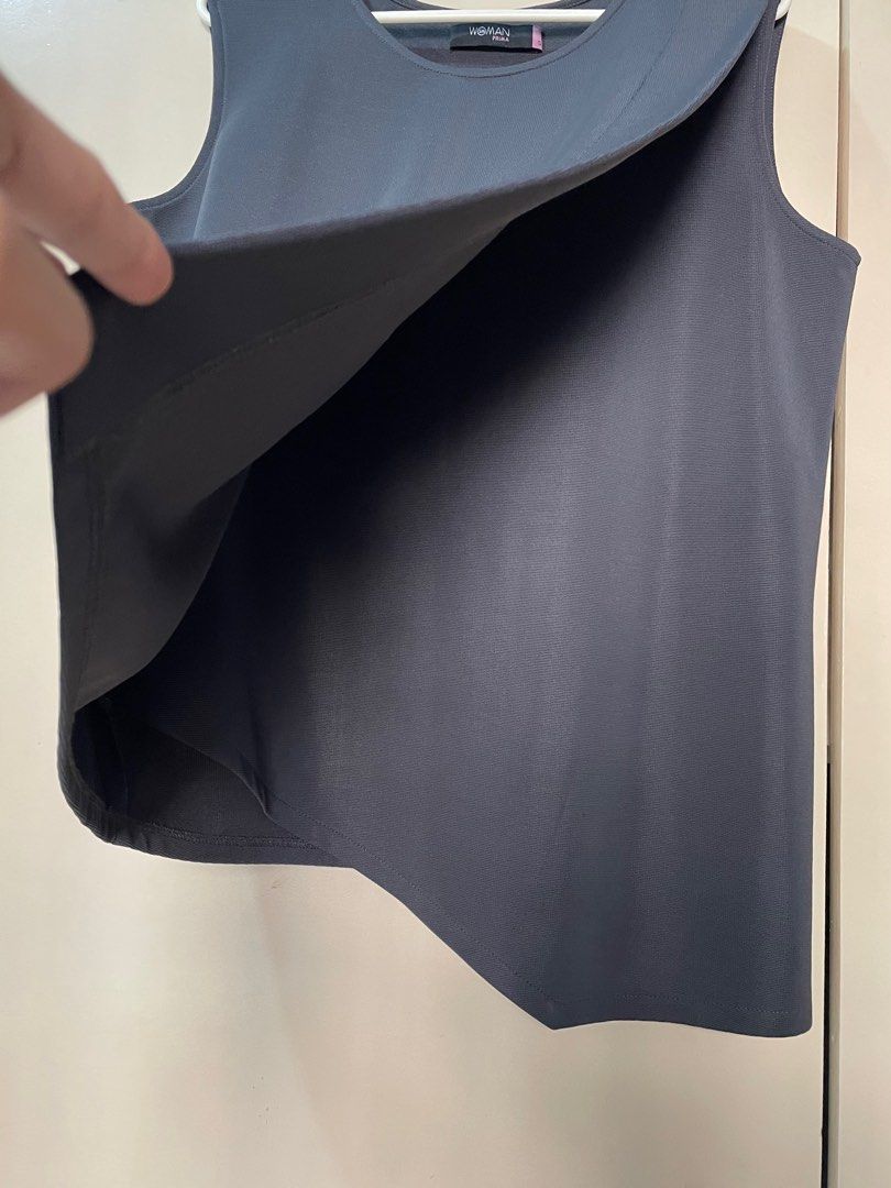 Sleeveless top (Category: Sleeveless) located in Marikina City. Submitted by micharon (Listing ID 1268778672, Image 2). Description: SM Prima top S on tag but fits up to L The fabric in front makes a perfect bilbil cover hehe W 19 L (short side) 23.