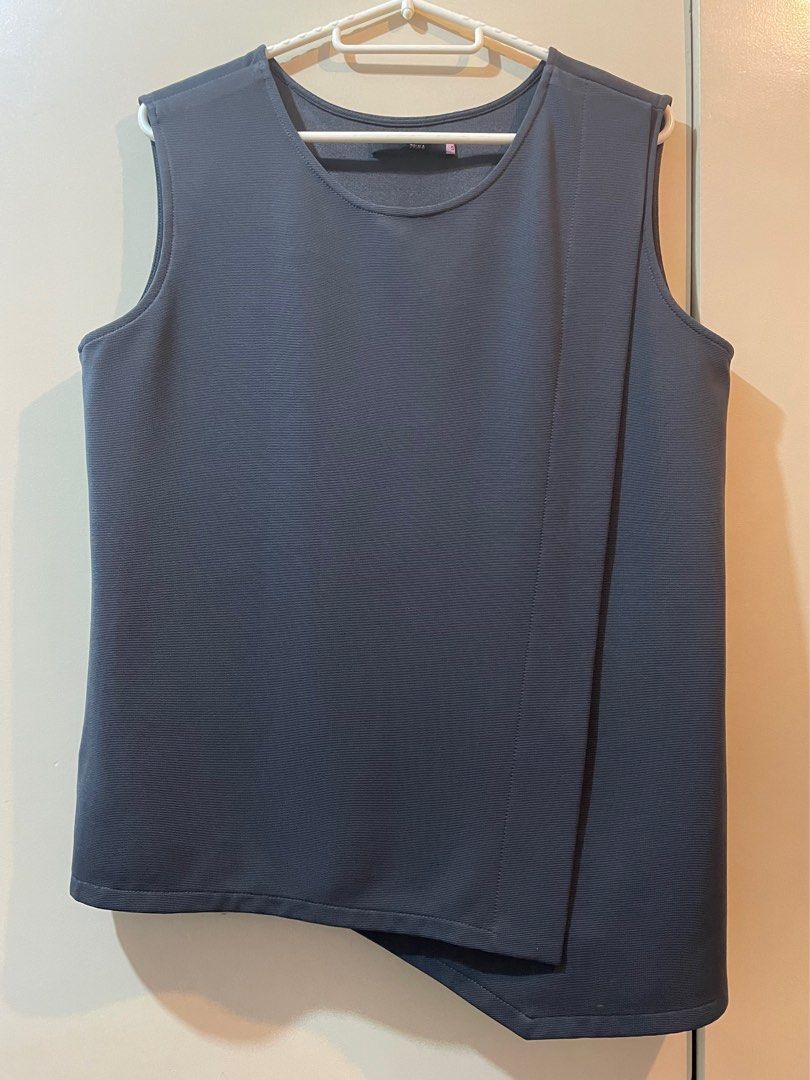 Sleeveless top (Category: Sleeveless) located in Marikina City. Submitted by micharon (Listing ID 1268778672, Image 1). Description: SM Prima top S on tag but fits up to L The fabric in front makes a perfect bilbil cover hehe W 19 L (short side) 23.