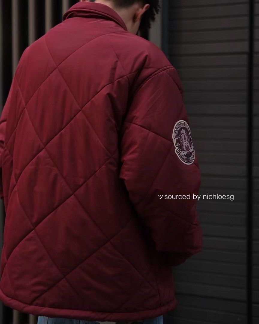 BAPE PATCH COACH JACKET (Category: Coats, Jackets and Outerwear) located in Singapore. Submitted by nichloesg (Listing ID 1267133213, Image 2). Description: ✅ Mens ✅ Navy, red A coach jacket made of nylon material with a quilted pattern. The design features a B logo patch on the left chest, a circle patch on the right shoulder, a letter graphic on the left chest, and the Bape logo directly embroidered on the right chest. A piss name is sandwiched