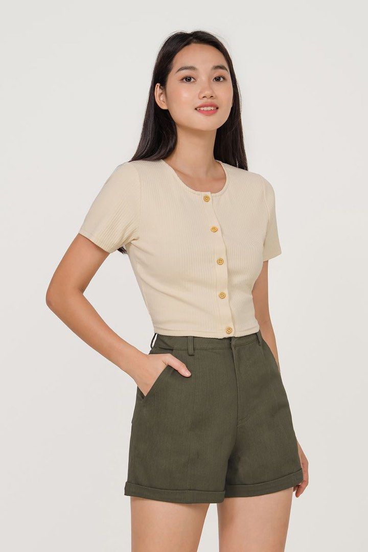 Edria Ribbed Button Down Top (Category: Blouses) located in Singapore. Submitted by quinn_wardrobe (Listing ID 1270545855, Image 3). Description: You knit to have this Round neckline Cropped silhouette Ribbed stretchy material Size S in Cream *selling as not into cropped .