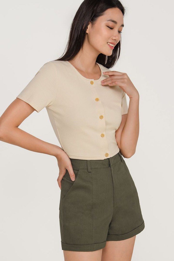 Edria Ribbed Button Down Top (Category: Blouses) located in Singapore. Submitted by quinn_wardrobe (Listing ID 1270545855, Image 2). Description: You knit to have this Round neckline Cropped silhouette Ribbed stretchy material Size S in Cream *selling as not into cropped .