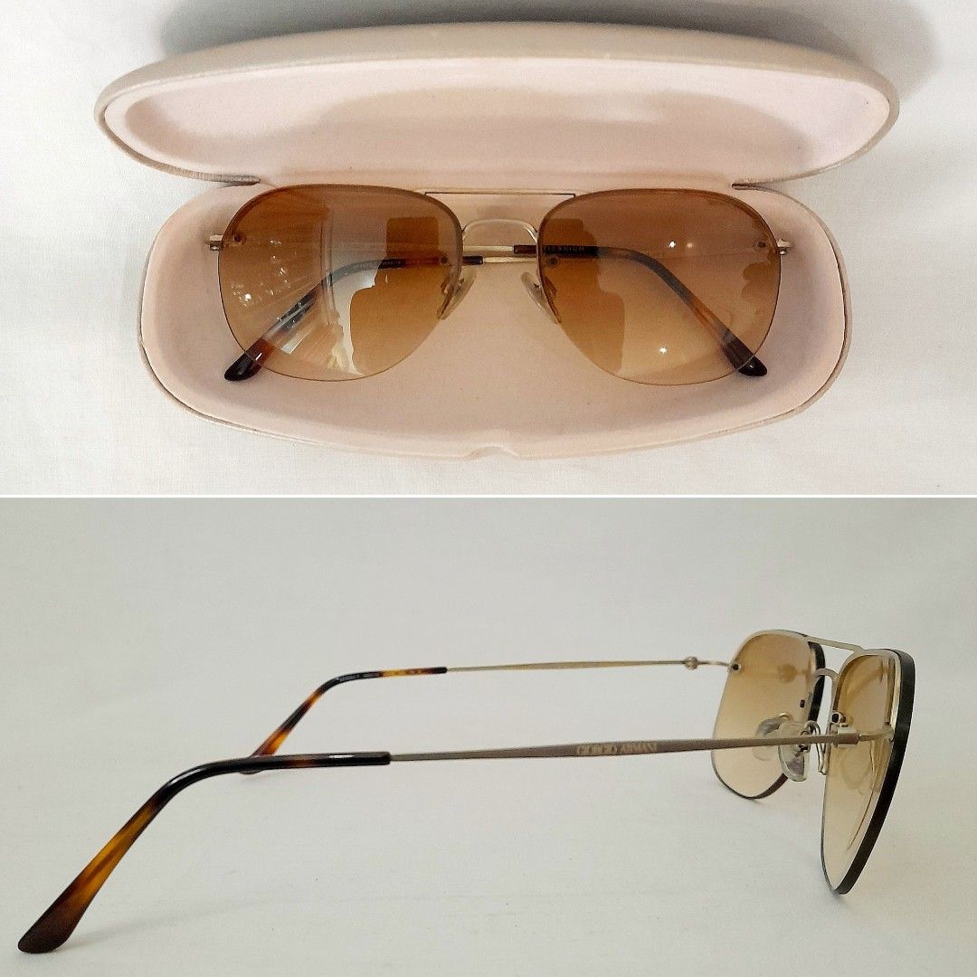 Giorgio Armani AR6004-T Sunglasses (Category: Sunglasses & Eyewear) located in Quezon City. Submitted by lovedlux (Listing ID 1270481602, Image 2). Description: No designer does Quiet Luxury better than Giorgio Armani! Unisex Retails at P14+K Serial No: 8A4557492 (3rd pic right lens) Matte pale gold titanium frame. Ultra light! Gradient brown lenses Measurements in 7th pic Bought in UAE Original case flaked due to long storage. Will replace with 