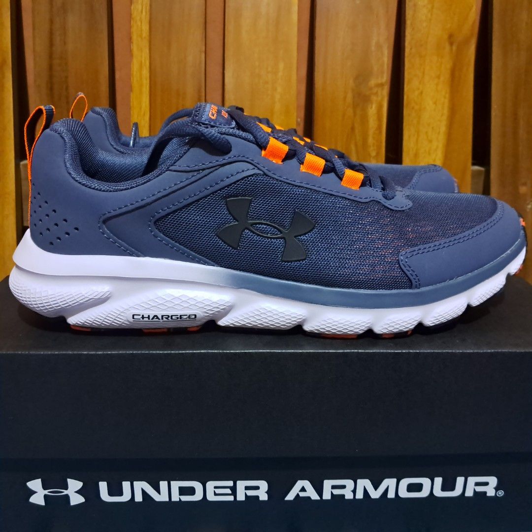 Sepatu running under armour store