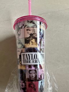 Taylor Swift with straw charm tumbler