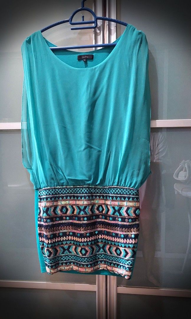 Dress with loose store top and tight bottom