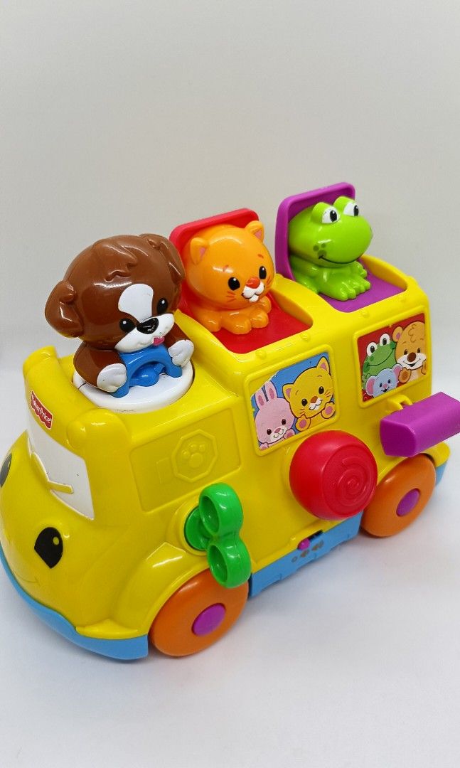 Fisher price musical pop up bus hotsell