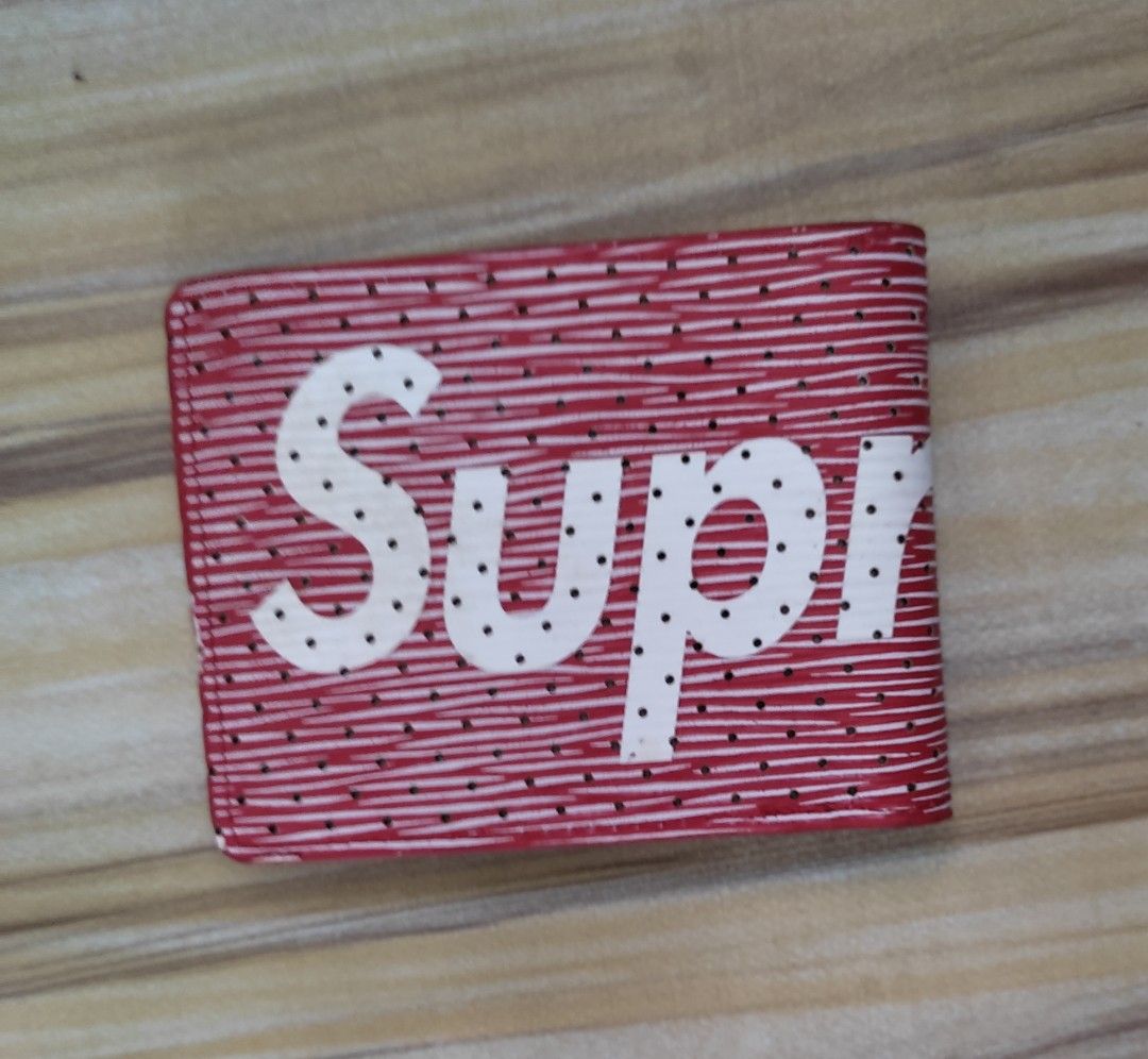 Supreme wallet cost sale