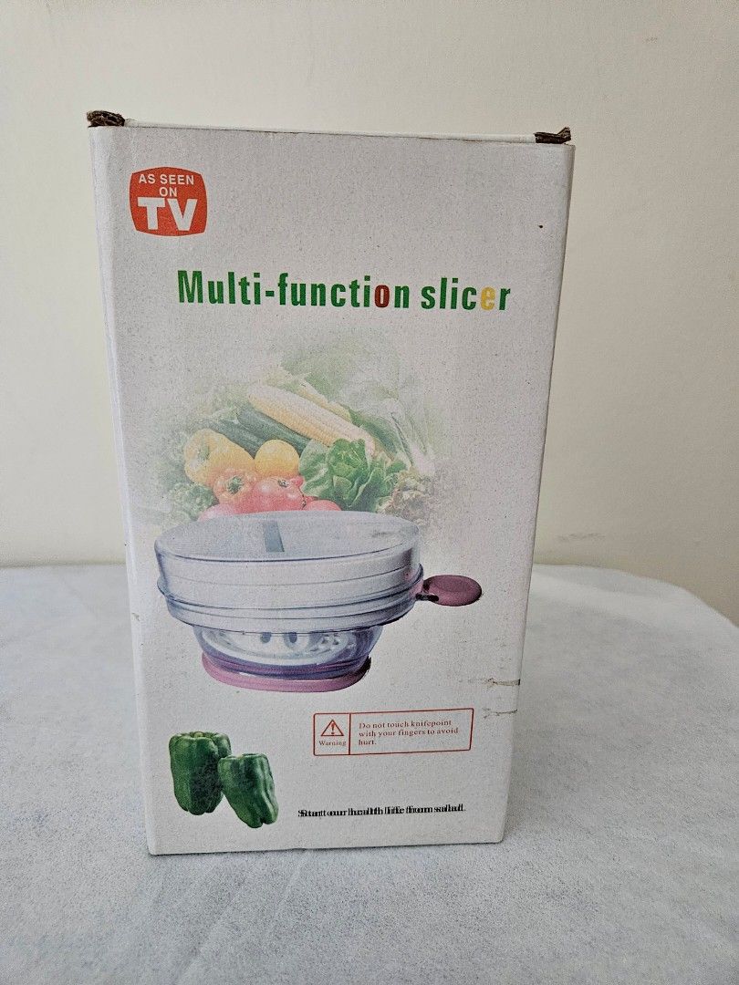 Multi Function Slicer (Category: Other Kitchen Appliances) located in Singapore. Submitted by usedselling (Listing ID 1270698213, Image 1). Description: Never use before and note it has been kept for long time..