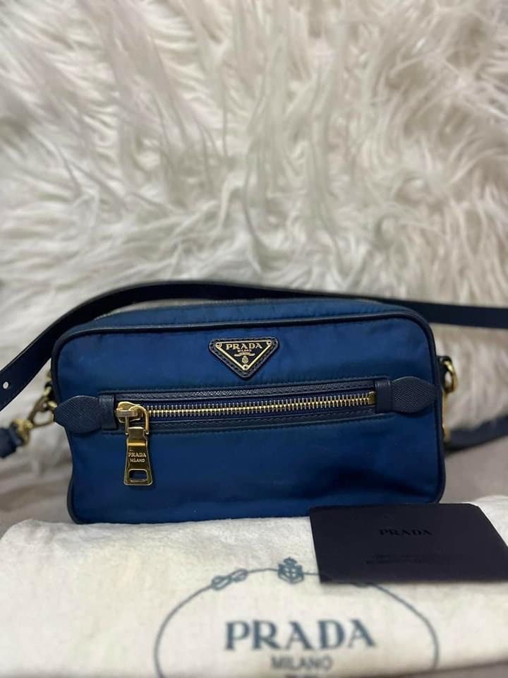 Prada Tessuto Blue Nylon Sling / Saffiano Strap (Category: Luxury Bags & Wallets) located in Manila. Submitted by bagislifeshop (Listing ID 1270707014, Image 2). Description: ON HAND IN PH 🇵🇭 100% Authentic Prada Tessuto Blue Nylon Sling / Saffiano Strap Condition 8/10 Comes with Dustbag and Authenticity Card .