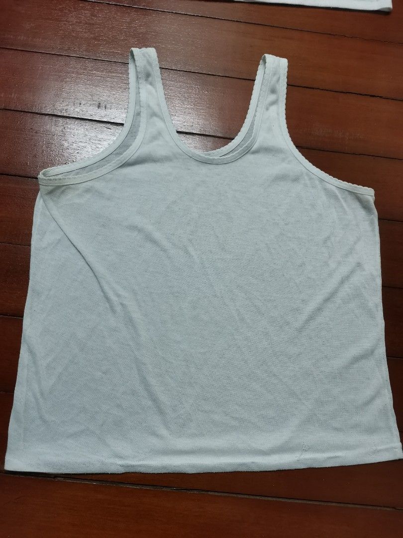 Singlet (Category: Sleeveless) located in Putatan. Submitted by shamimi006 (Listing ID 1270798757, Image 3). Description: Item preloved/used Condition macam dalam pic Bekas inner untuk baju kurung sekolah menengah Saiz L/XL Harga untuk 2 helai Payment online transfer sahaja Kalau berminat boleh pm tepi Tq 😊.