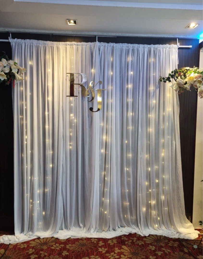 Wedding Decorations (Bundle Set) (Category: Occasions & Party Supplies) located in Singapore. Submitted by sunshineshopee (Listing ID 1244991821, Image 8). Description: Bundle Set Worth $120 White Curtain with Fairy Lights Pole Silver Bling Photo Frames Gold Bling Photo Frames Display Accessories Artificial Flowers Flower Petals Mixture Glass Vase Etc....