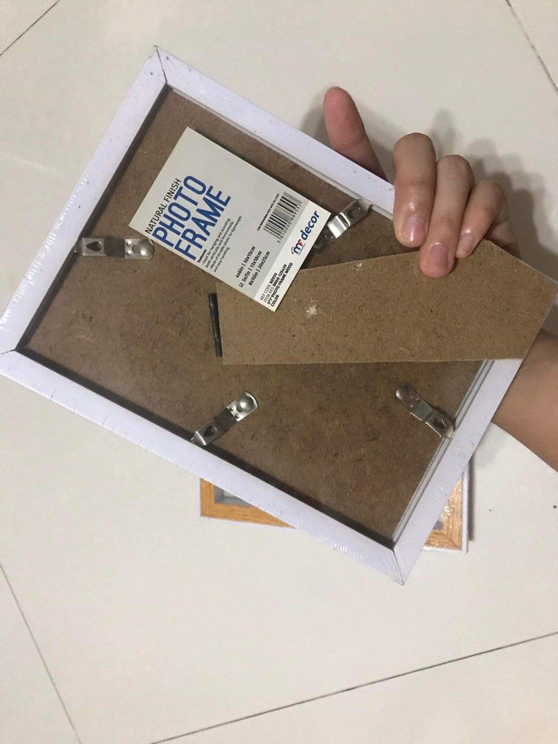 White wooden picture frame (2 for 150) (Category: Frames & Pictures) located in Caloocan City. Submitted by shopsunshine (Listing ID 1270694004, Image 3). Description: .