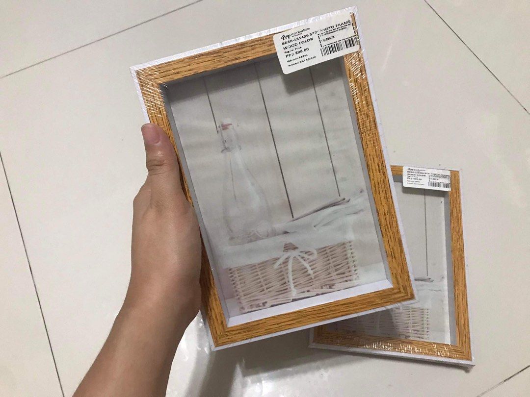 White wooden picture frame (2 for 150) (Category: Frames & Pictures) located in Caloocan City. Submitted by shopsunshine (Listing ID 1270694004, Image 1). Description: .