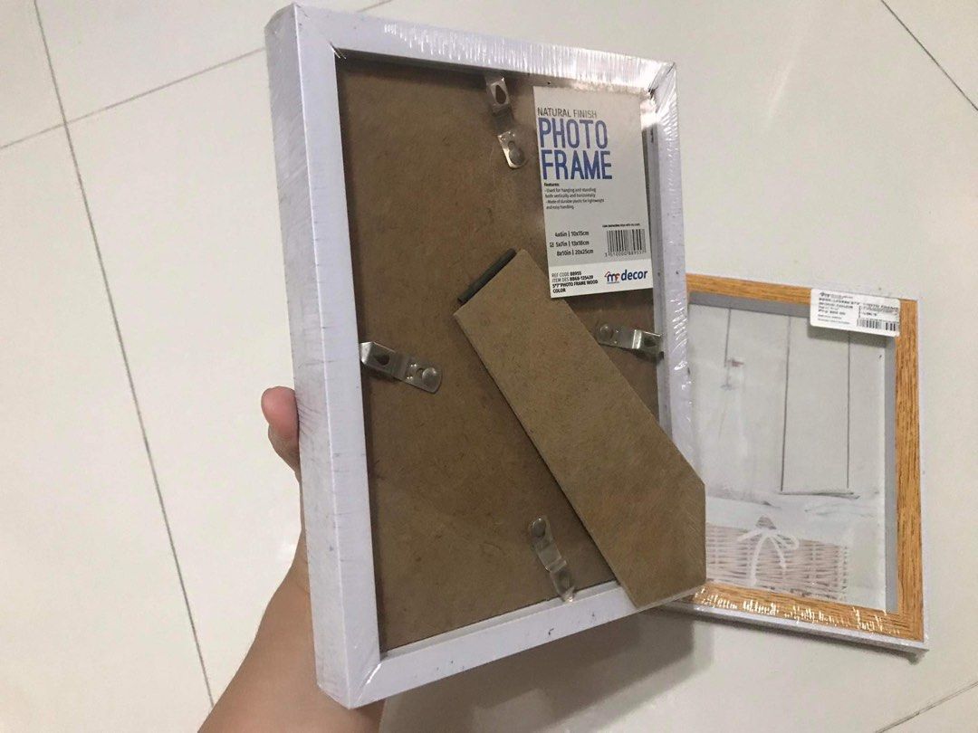 White wooden picture frame (2 for 150) (Category: Frames & Pictures) located in Caloocan City. Submitted by shopsunshine (Listing ID 1270694004, Image 2). Description: .