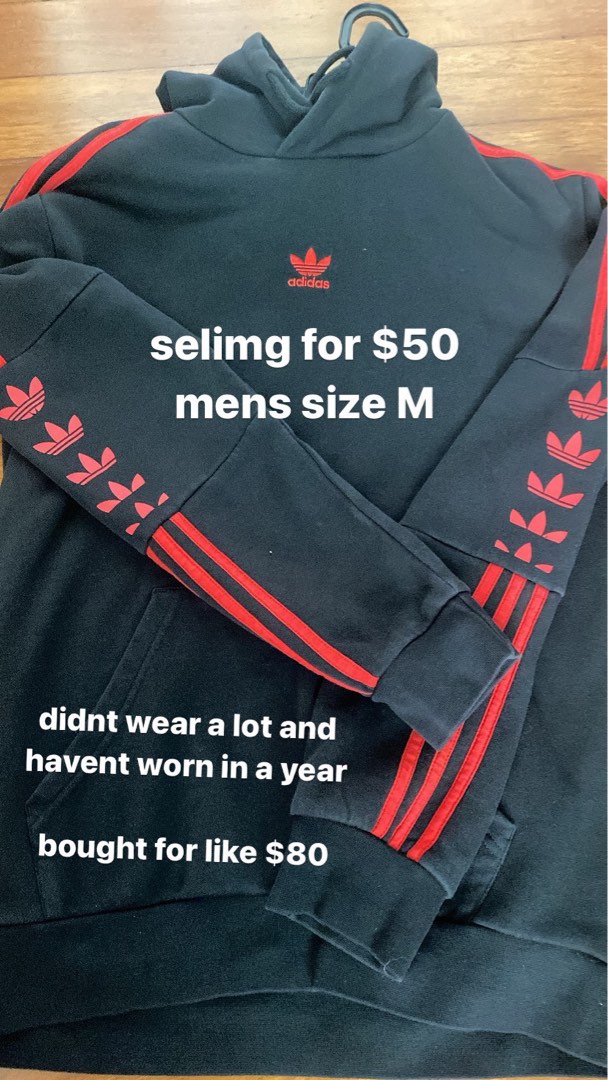 Red and black adidas sweater top