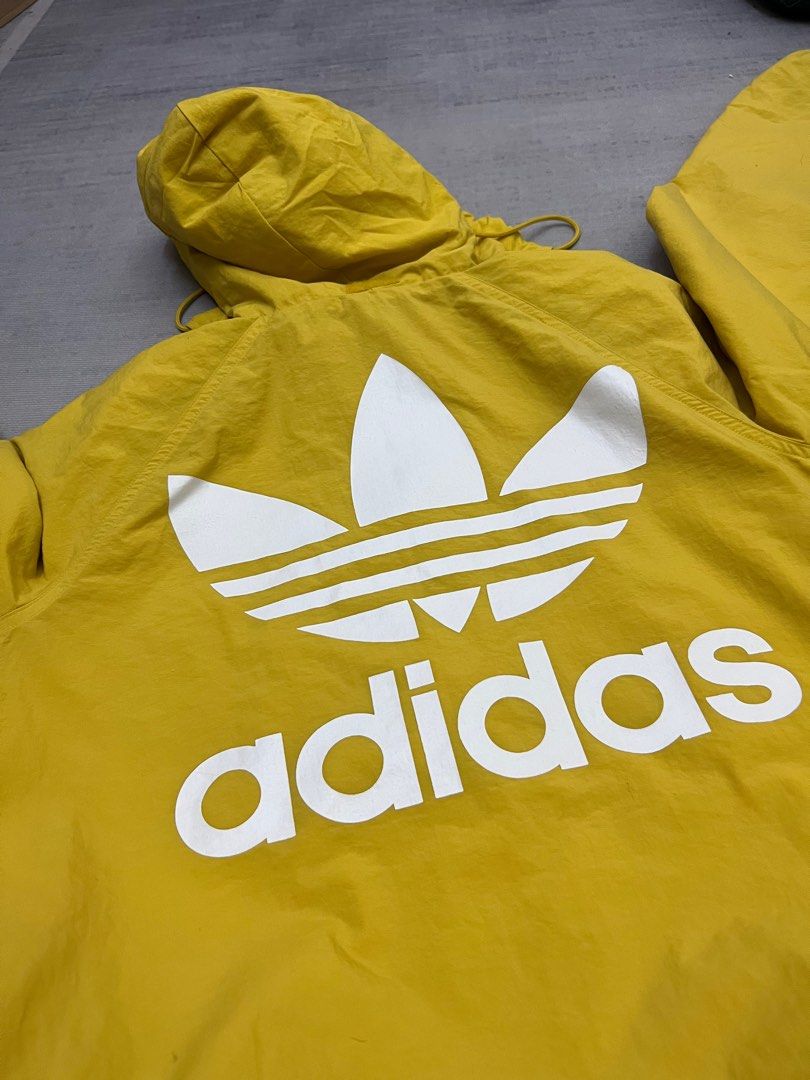 Adidas originals stadium jacket yellow top