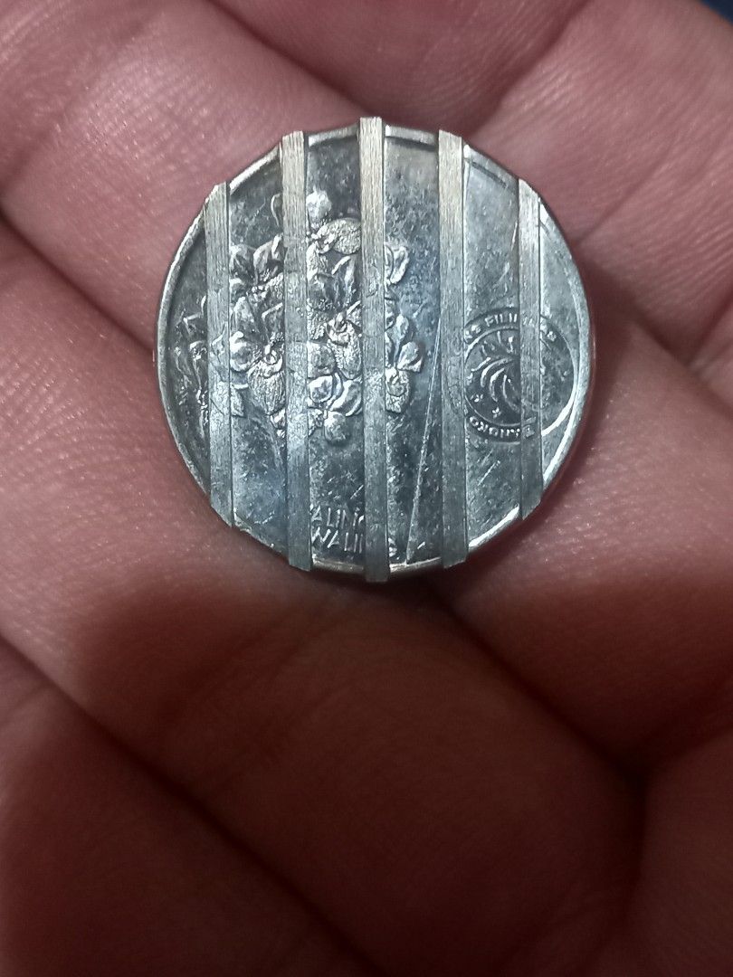 Cancelled error 1 piso ngc coin no.3 (Category: Currency) located in Subic. Submitted by regiegabriel29 (Listing ID 1270983722, Image 2). Description: add sf.