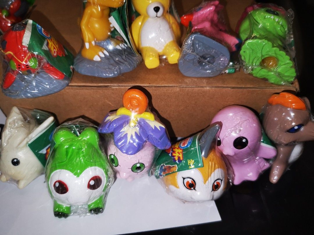 Digimon Kimmy Nestle topper figures sealed set (Category: Figurines & Statues) located in Baliuag. Submitted by mikeeoncarousel (Listing ID 1270838920, Image 2). Description: Digimon Kimmy Nestle topper figures sealed set They are sealed in its original packaging Set of 11 digimon in plastic packaging.