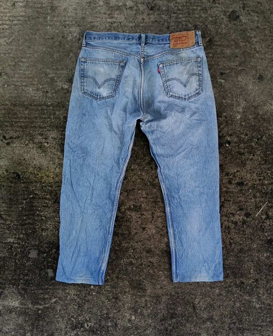 Levis 501 ripped, Men's Fashion, Bottoms, Jeans on Carousell