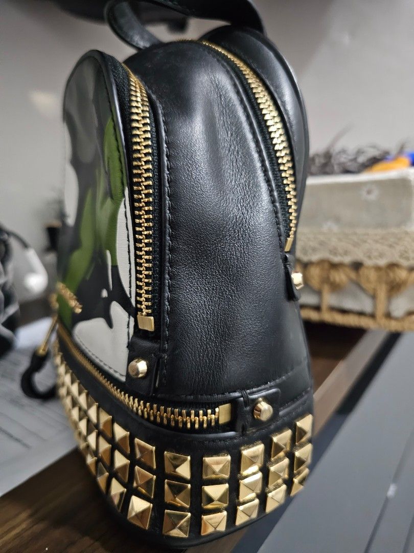 Rhea mini butterfly hotsell camo leather backpack