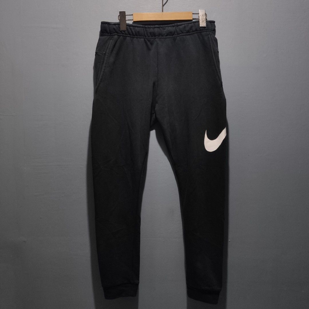 Nike big swoosh sweatpants 2025
