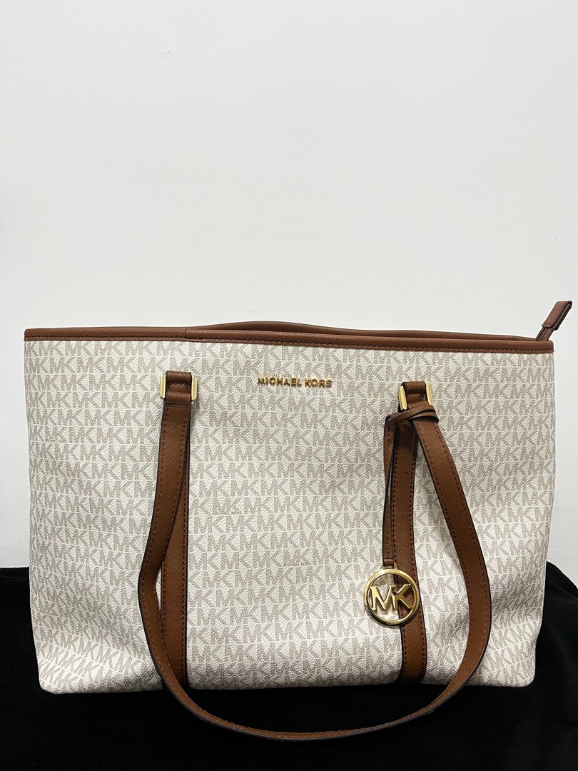 How to clean inside lining of michael kors bag store