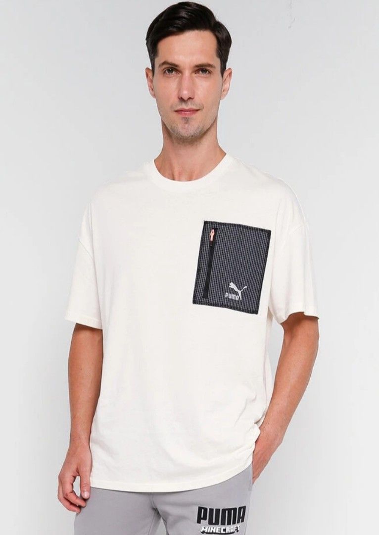 PUMA- Pocket tee (Category: Tshirts & Polo Shirts ) located in Manila. Submitted by agentus (Listing ID 1270928469, Image 1). Description: PUMA Hill Camp Pocket Men's T shirt color- PRISTINE ( off white).