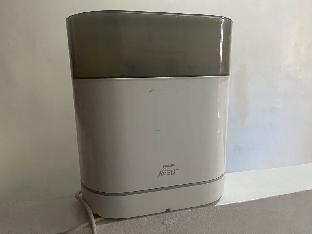 Avent 4in1 sterilizer (Category: Breastfeeding & Bottle Feeding) located in Taguig. Submitted by tinvc (Listing ID 1271076390, Image 2). Description: No warranty, no box White dishwasher basket missing Working condition, as is. RFS: decluttering Loc: near Vista Mall Taguig.