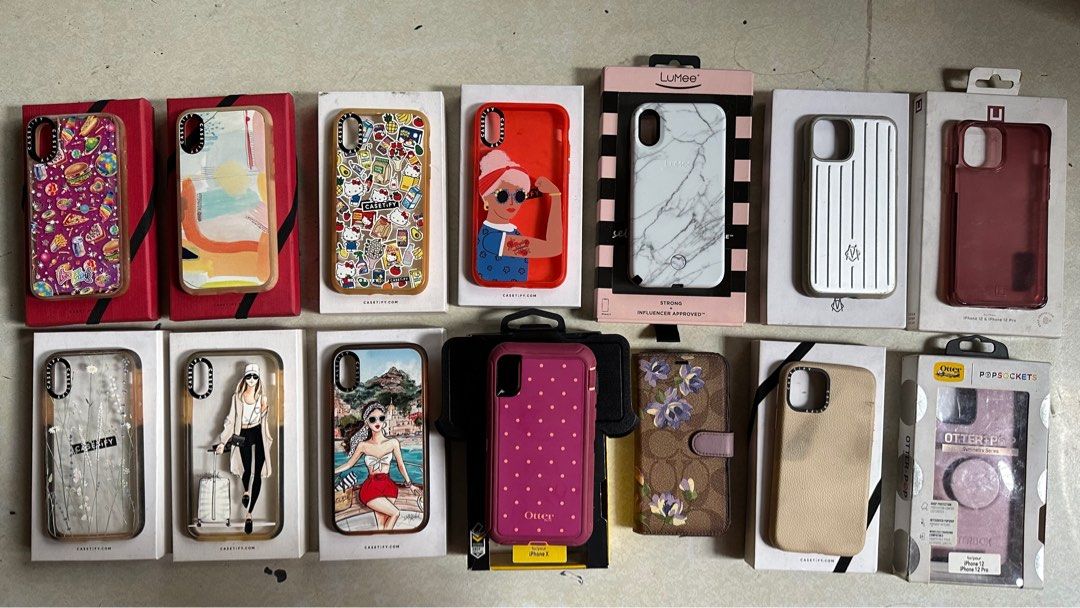 Preloved iPhone X/11 Pro/12 Pro Cases (Category: Cases & Sleeves) located in Malabon City. Submitted by heyatenicole (Listing ID 1271078993, Image 1). Description: ALL ARE AUTHENTIC AND NEGOTIABLE. iPhone X Casetify Bundle (7 pcs) - 1,000 - Yellowish Sides iPhone X Otter Defender - 300 iPhone X Lumee - 500 - Yellowish Sides iPhone X Coach - 500 - Slight flakey sides iPhone 11 Pro Rimowa Aluminum - 2,000 - Heat marks on the sides iPhone 11 Pro Cas