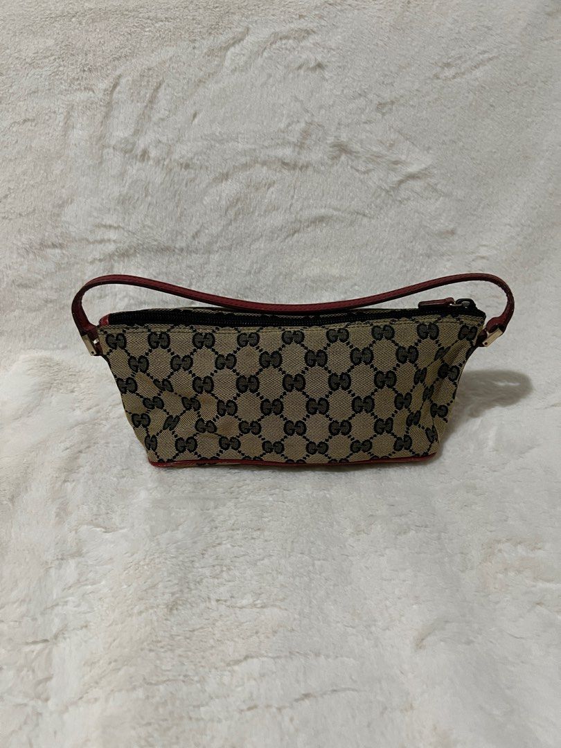 💯 RUSH Authentic Gucci Monogram Boat Pochette (Category: Luxury Bags & Wallets) located in Paranaque City. Submitted by authentic_mj (Listing ID 1262361414, Image 2). Description: 💯 RUSH Authentic Gucci Monogram Boat Pochette Bought in Japan Gold hardware.