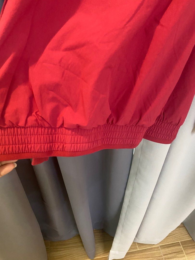 Authentic Adidas Red Jacket (Category: Coats, Jackets and Outerwear) located in Bulacan. Submitted by mhythriftylove (Listing ID 1271399821, Image 3). Description: Authentic Adidas Red Jacket, in good condition color 10/10, with side zipper. Small on tag but it can fit up to medium.
