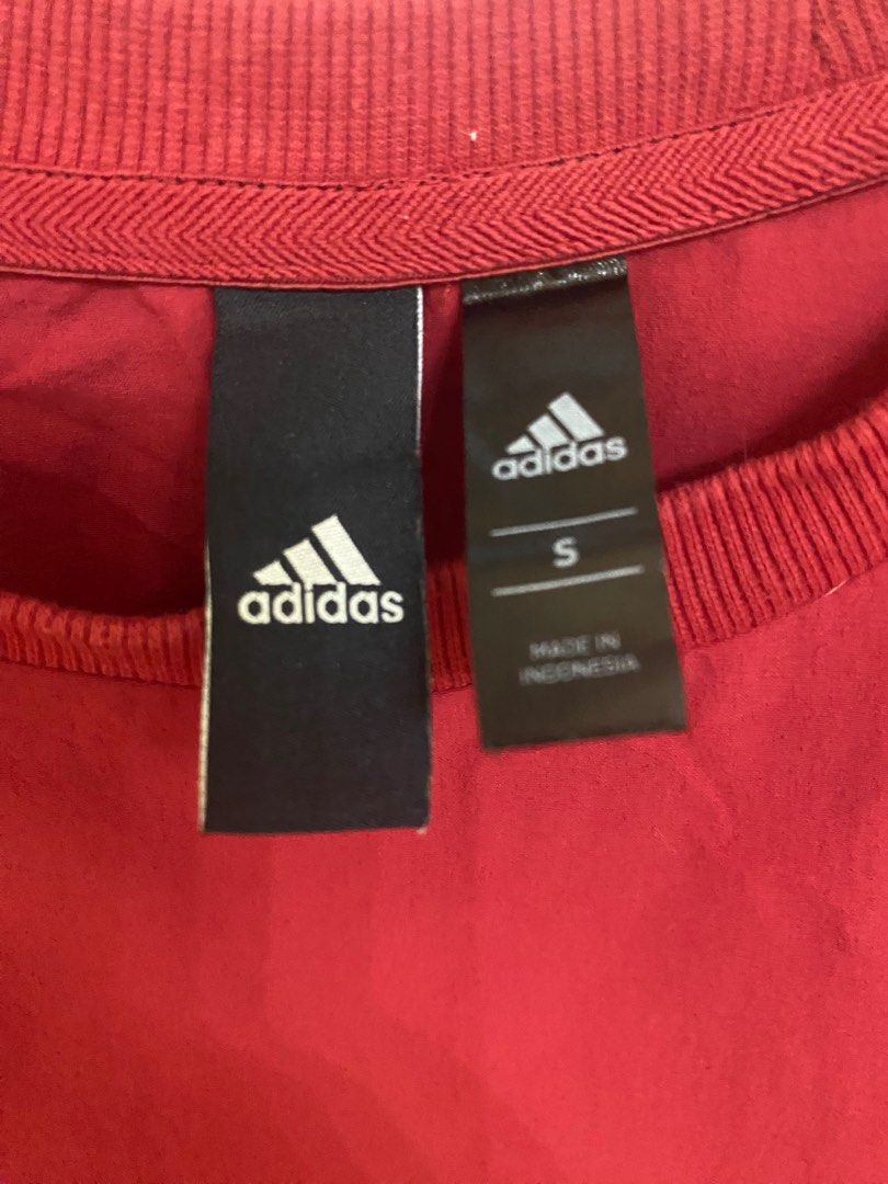 Authentic Adidas Red Jacket (Category: Coats, Jackets and Outerwear) located in Bulacan. Submitted by mhythriftylove (Listing ID 1271399821, Image 2). Description: Authentic Adidas Red Jacket, in good condition color 10/10, with side zipper. Small on tag but it can fit up to medium.