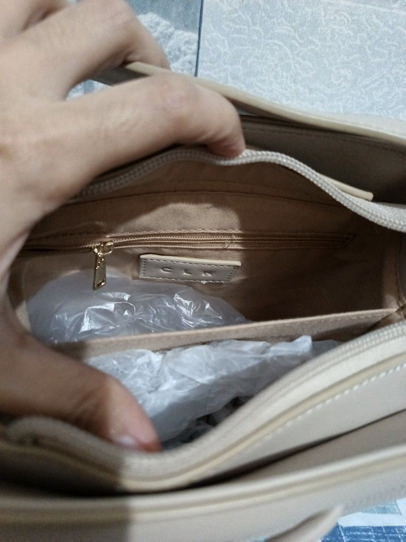 CLN Bucket Bag (Category: Shoulder Bags) located in Mandaluyong City. Submitted by simplicityk (Listing ID 1271424391, Image 3). Description: Original Affiliate Brand of So Fab, CMG and many more Good As New 💖 Once or Twice lang nagamit Bag filings still inside so no deform. 💖 with original dust bag with free scarf for bag with detachable and adjustable strap very cute and nice material 🥰 0-minimal flaw 💖 RFS: not suitable for moms like me bu