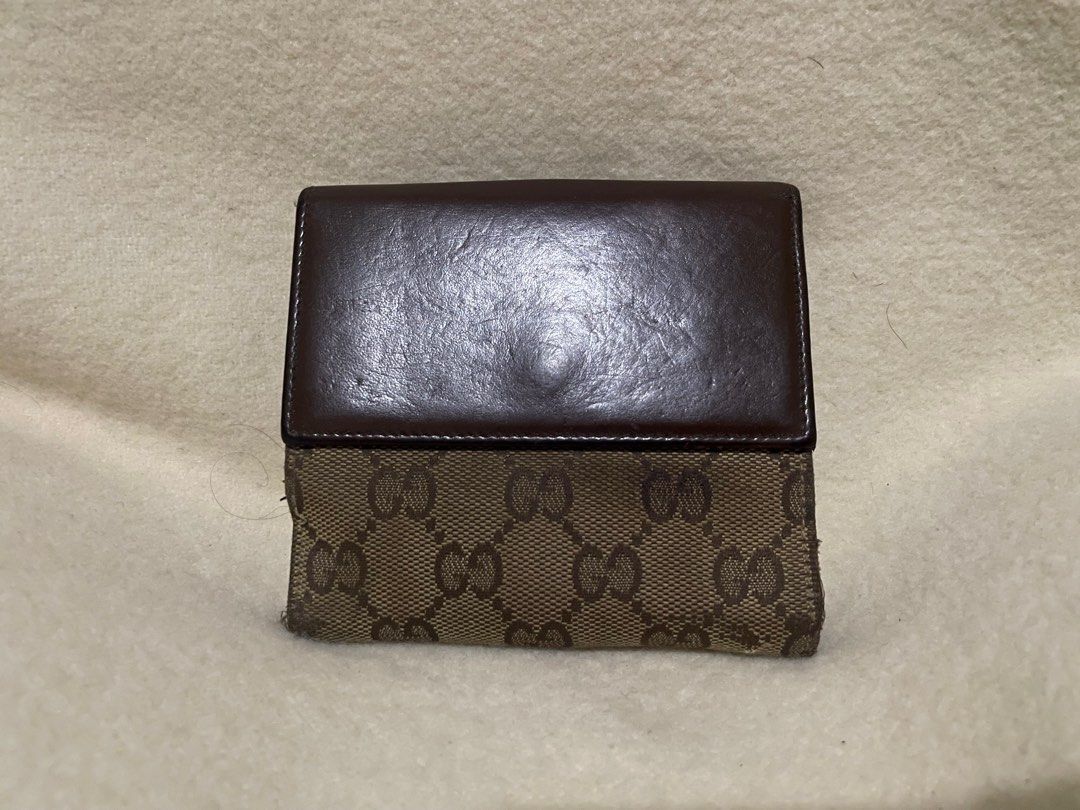 GUCCI monogram wallet (Category: Luxury Bags & Wallets) located in San Pablo. Submitted by prelovedbymistyblue (Listing ID 1271317511, Image 2). Description: Authentic GUCCI wallet. Canvass and leather combination. With signs of use and minimal rubs on the canvass. Still very functional. Has many card slots. japan preloved. Selling low for 3600. .
