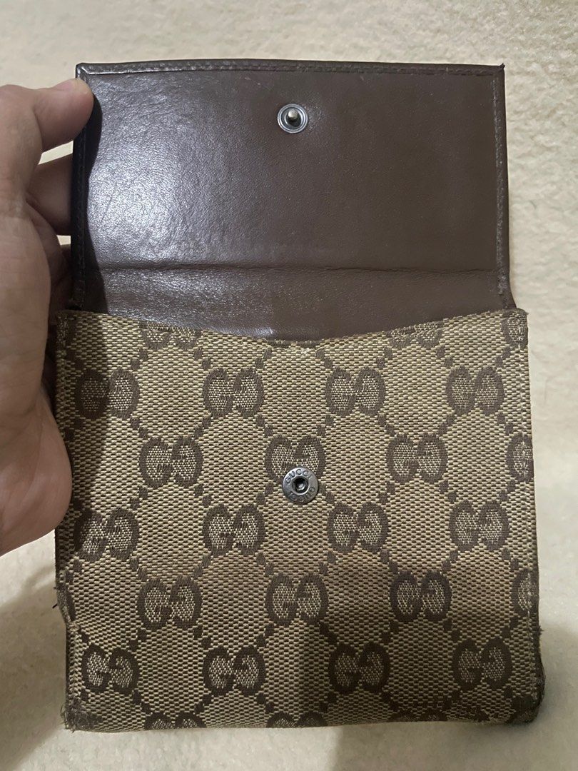 GUCCI monogram wallet (Category: Luxury Bags & Wallets) located in San Pablo. Submitted by prelovedbymistyblue (Listing ID 1271317511, Image 3). Description: Authentic GUCCI wallet. Canvass and leather combination. With signs of use and minimal rubs on the canvass. Still very functional. Has many card slots. japan preloved. Selling low for 3600. .